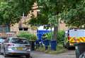 Fire investigators and police attend scene of serious fire at Cambridge flats