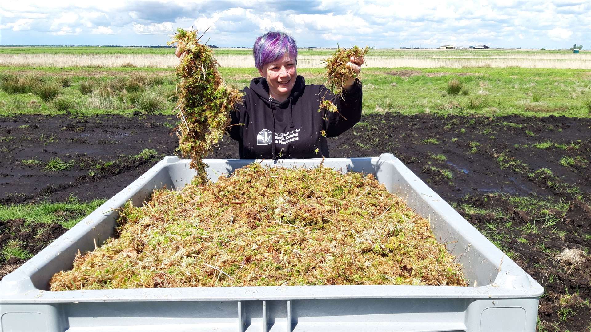 Lorna Parker, Great Fen restoration manager, with sphagnum moss. Picture: Wildlife Trust BCN